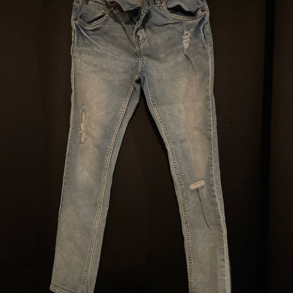 Distressed Light Blue Jeans